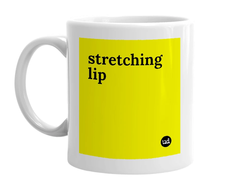 White mug with 'stretching lip' in bold black letters