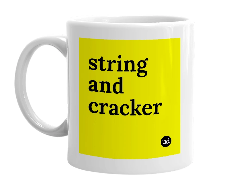 White mug with 'string and cracker' in bold black letters