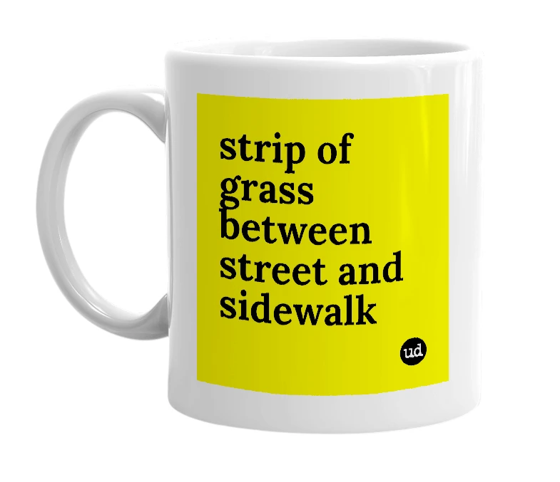 White mug with 'strip of grass between street and sidewalk' in bold black letters