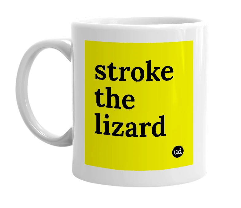 White mug with 'stroke the lizard' in bold black letters