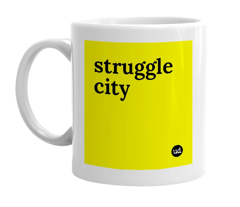 White mug with 'struggle city' in bold black letters