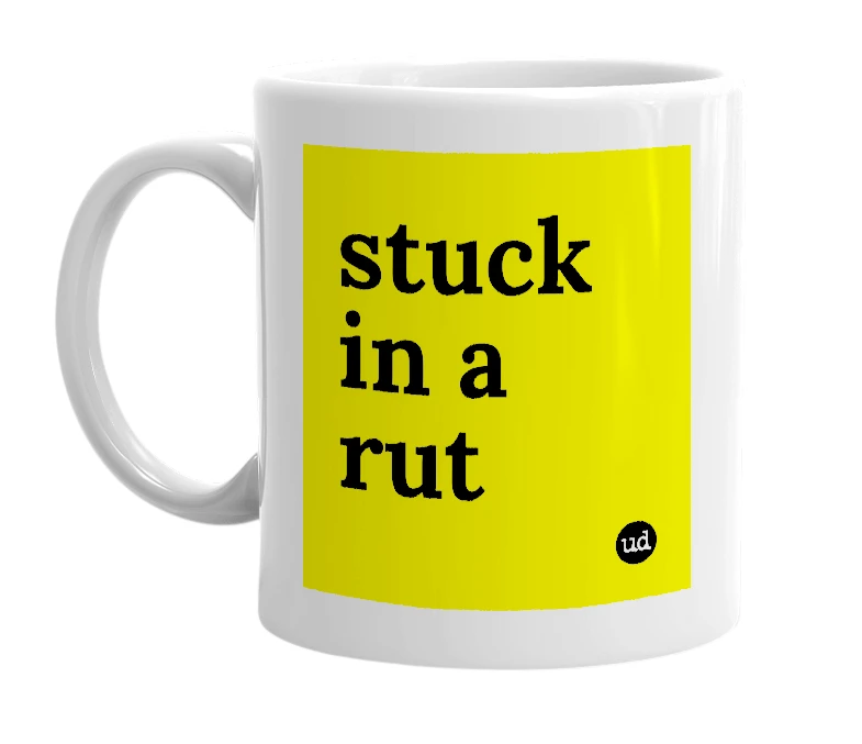 White mug with 'stuck in a rut' in bold black letters