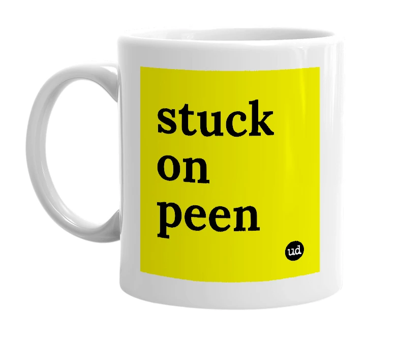 White mug with 'stuck on peen' in bold black letters