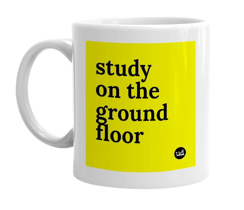 White mug with 'study on the ground floor' in bold black letters