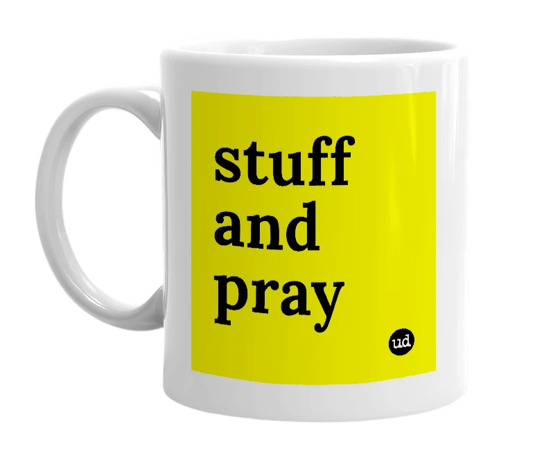 White mug with 'stuff and pray' in bold black letters