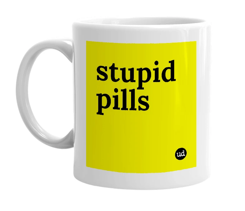 White mug with 'stupid pills' in bold black letters