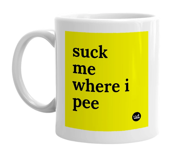 White mug with 'suck me where i pee' in bold black letters