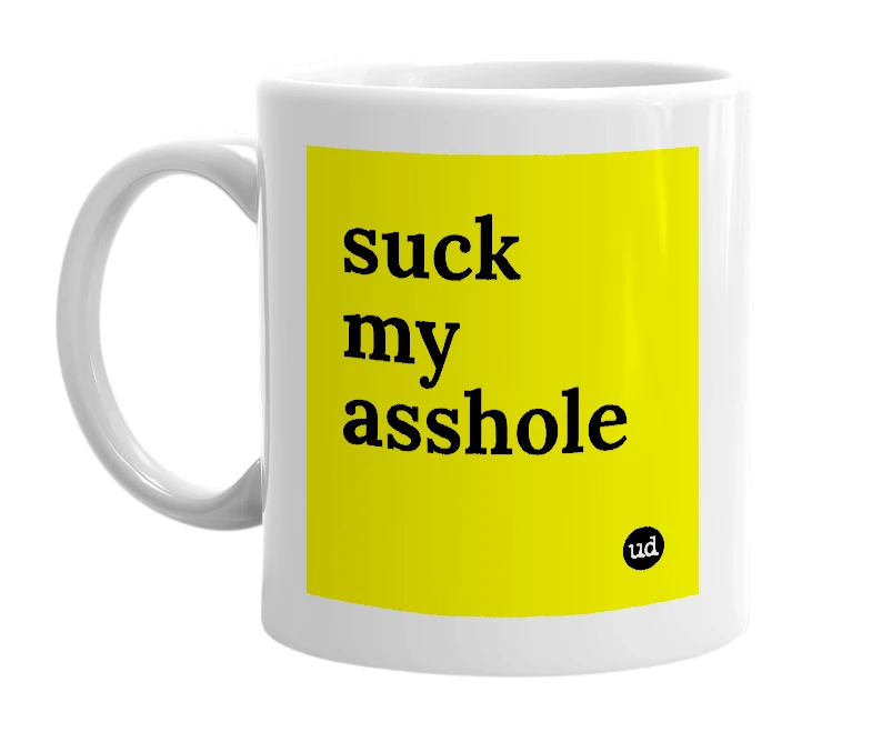 White mug with 'suck my asshole' in bold black letters