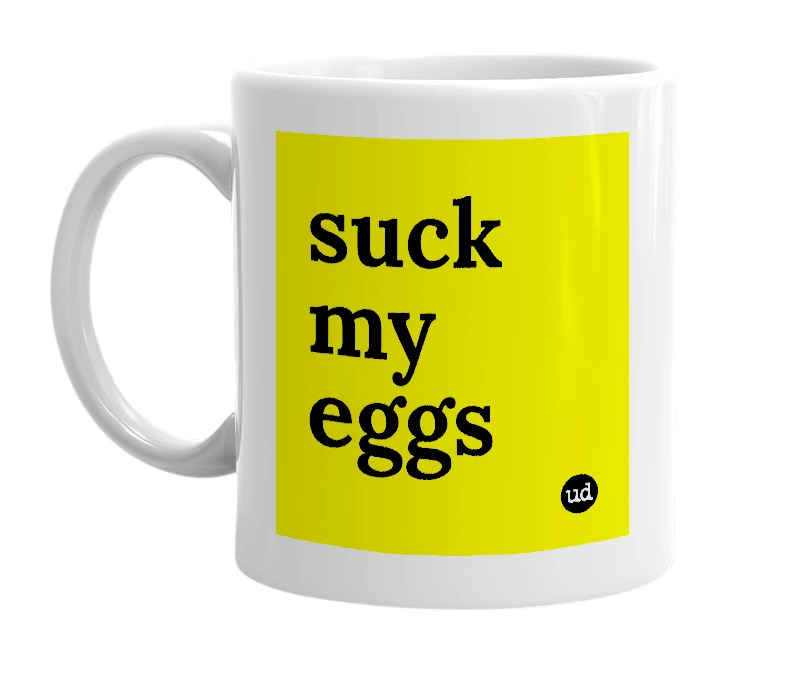 White mug with 'suck my eggs' in bold black letters