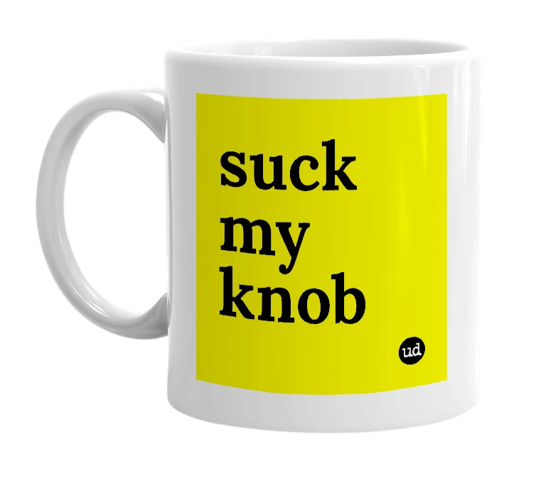 White mug with 'suck my knob' in bold black letters