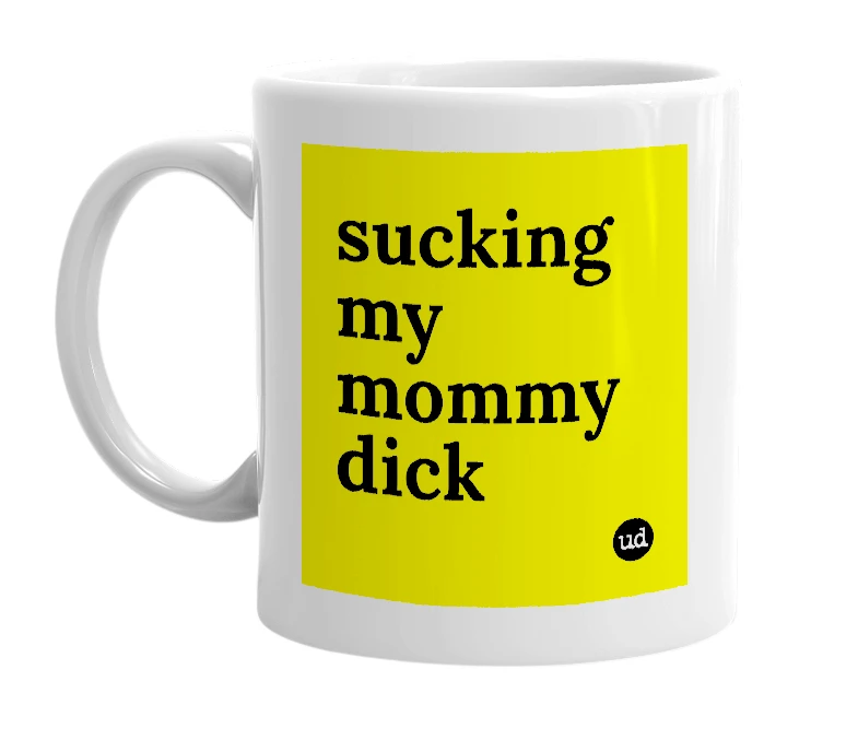 White mug with 'sucking my mommy dick' in bold black letters