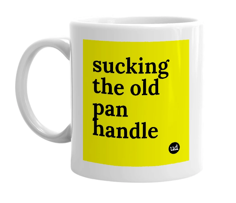 White mug with 'sucking the old pan handle' in bold black letters