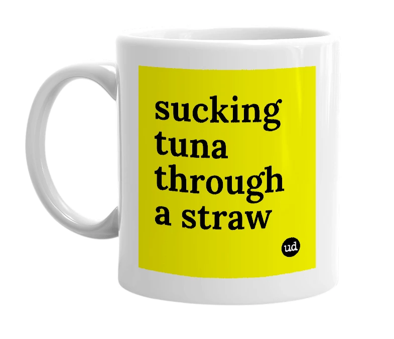 White mug with 'sucking tuna through a straw' in bold black letters