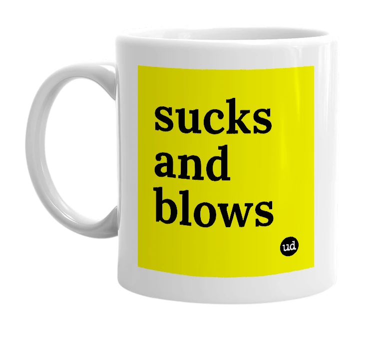 White mug with 'sucks and blows' in bold black letters