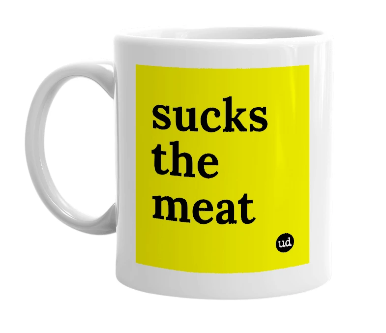 White mug with 'sucks the meat' in bold black letters