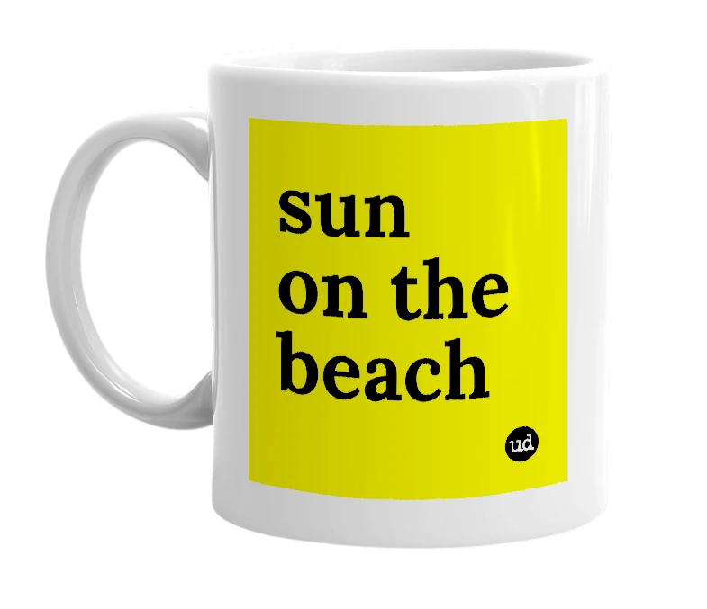 White mug with 'sun on the beach' in bold black letters