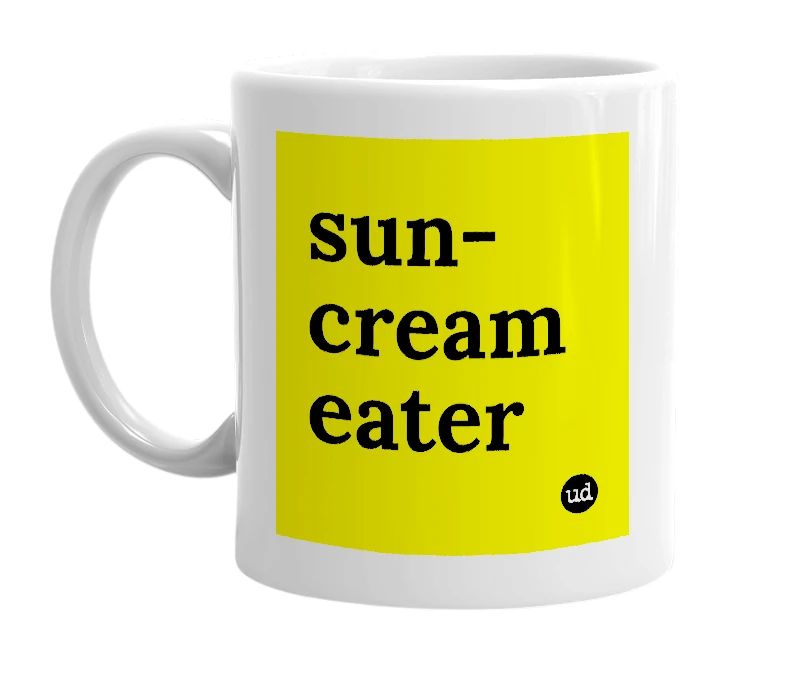 White mug with 'sun-cream eater' in bold black letters