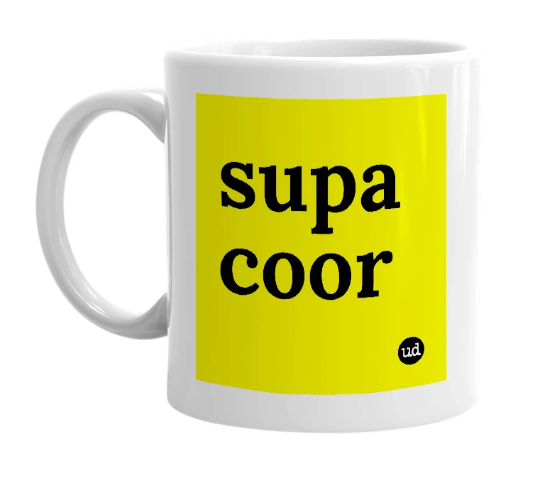 White mug with 'supa coor' in bold black letters