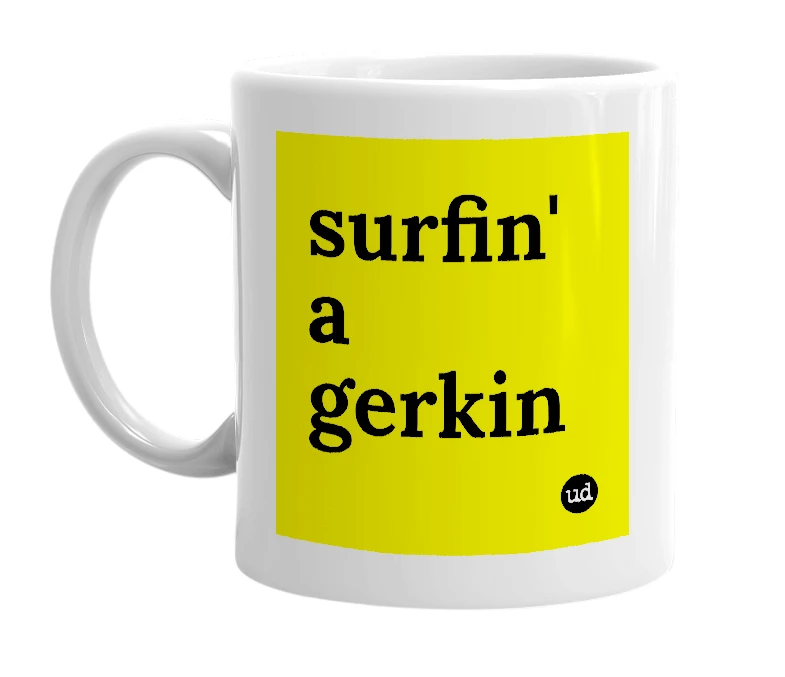 White mug with 'surfin' a gerkin' in bold black letters