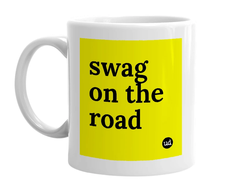 White mug with 'swag on the road' in bold black letters