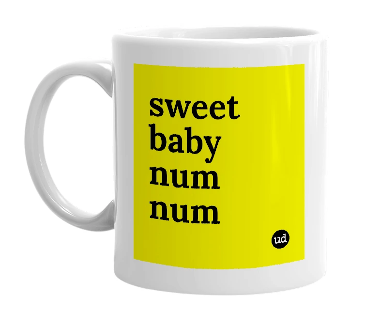 White mug with 'sweet baby num num' in bold black letters
