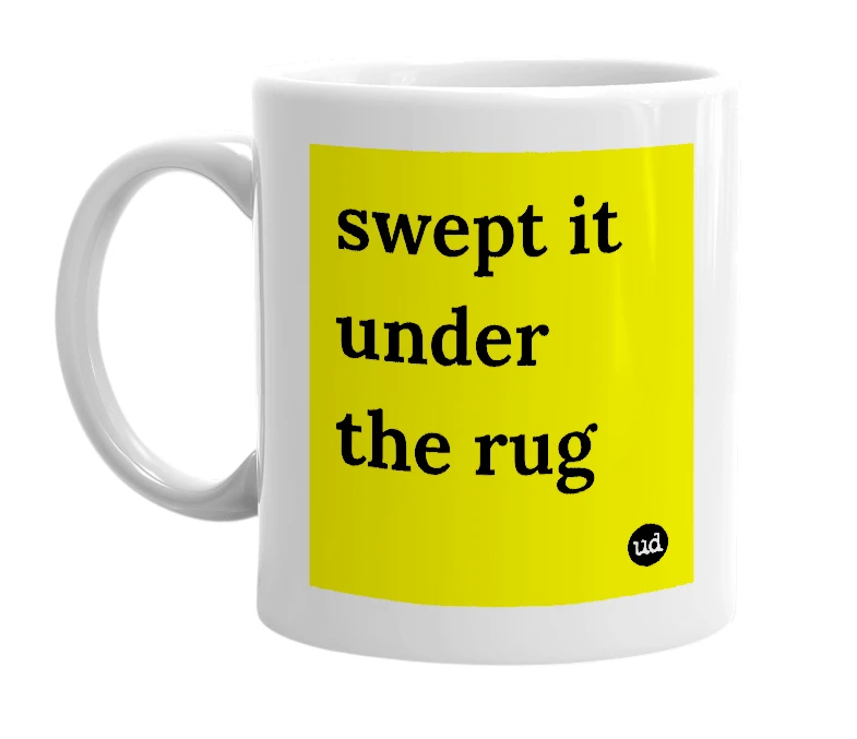 White mug with 'swept it under the rug' in bold black letters