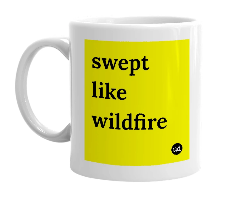 White mug with 'swept like wildfire' in bold black letters