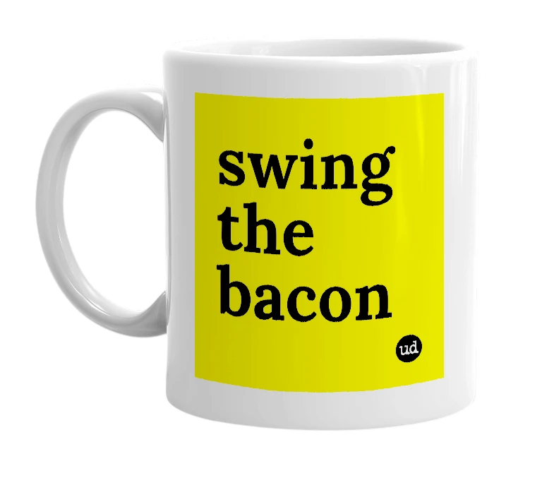 White mug with 'swing the bacon' in bold black letters