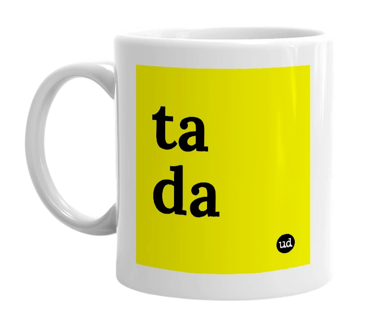 White mug with 'ta da' in bold black letters