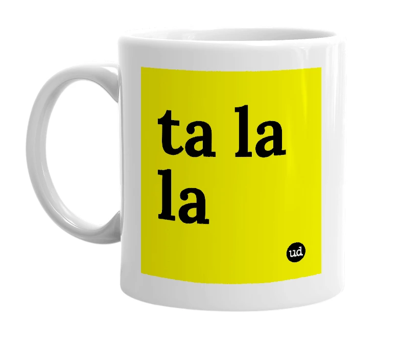 White mug with 'ta la la' in bold black letters