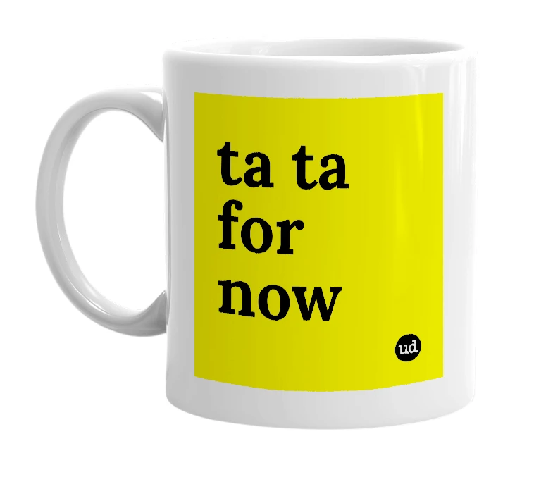 White mug with 'ta ta for now' in bold black letters