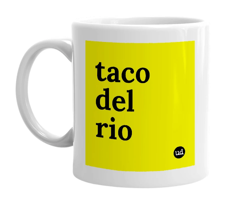 White mug with 'taco del rio' in bold black letters