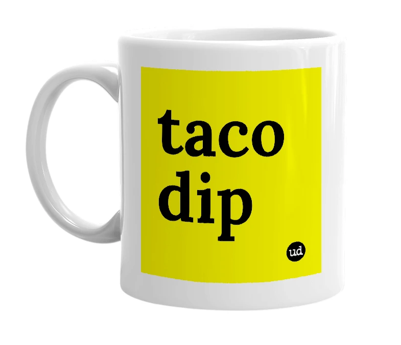 White mug with 'taco dip' in bold black letters