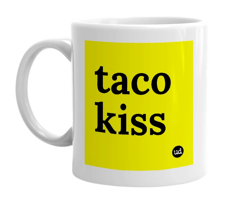 White mug with 'taco kiss' in bold black letters