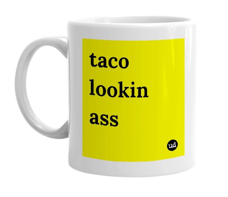 White mug with 'taco lookin ass' in bold black letters
