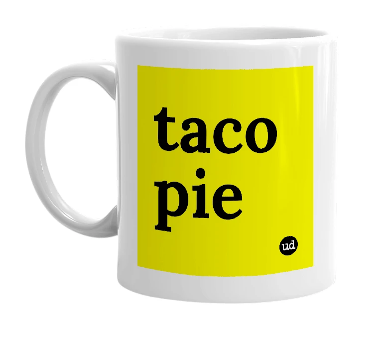 White mug with 'taco pie' in bold black letters