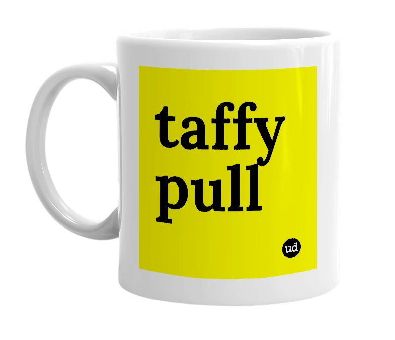 White mug with 'taffy pull' in bold black letters