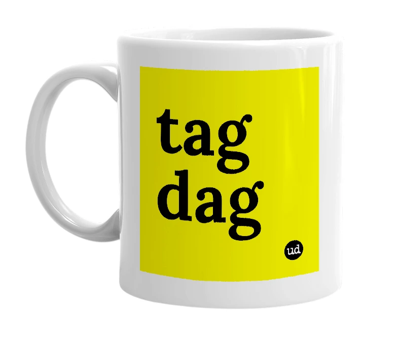 White mug with 'tag dag' in bold black letters