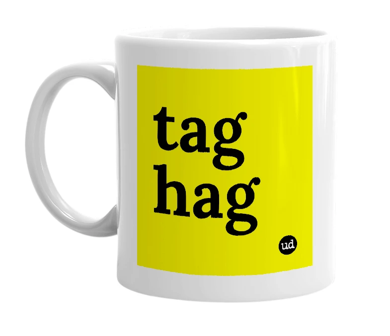 White mug with 'tag hag' in bold black letters