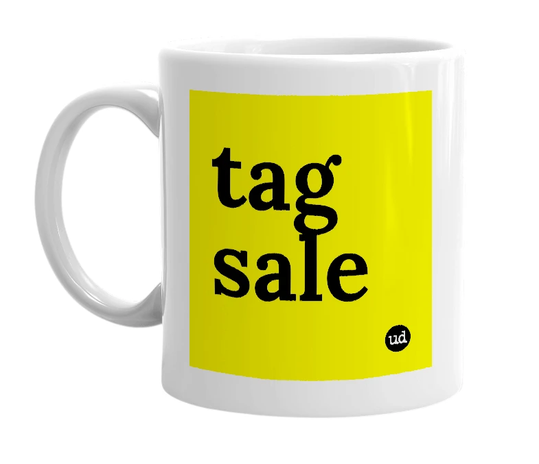 White mug with 'tag sale' in bold black letters