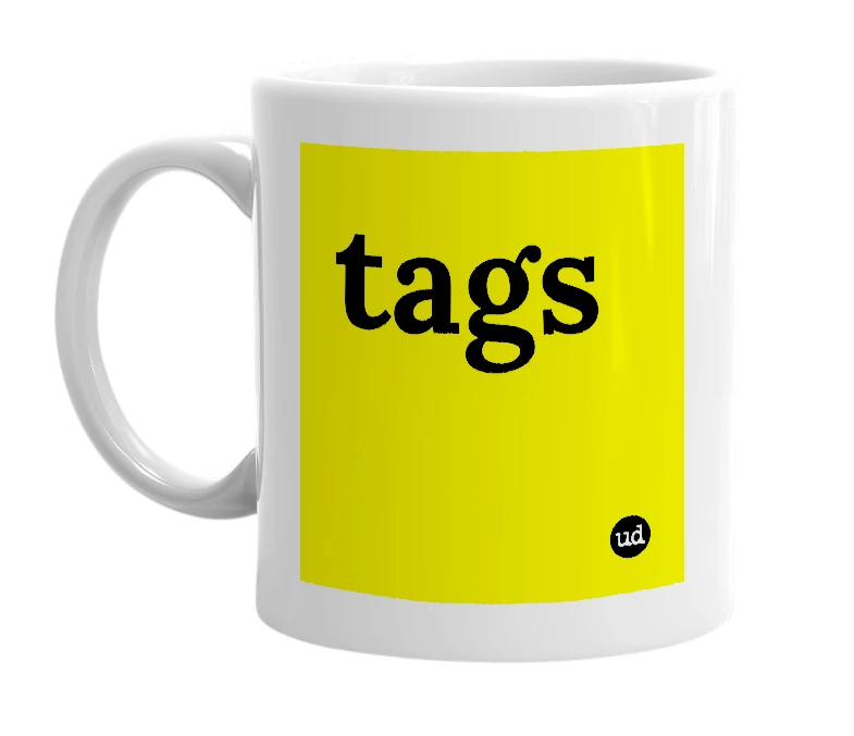 White mug with 'tags' in bold black letters