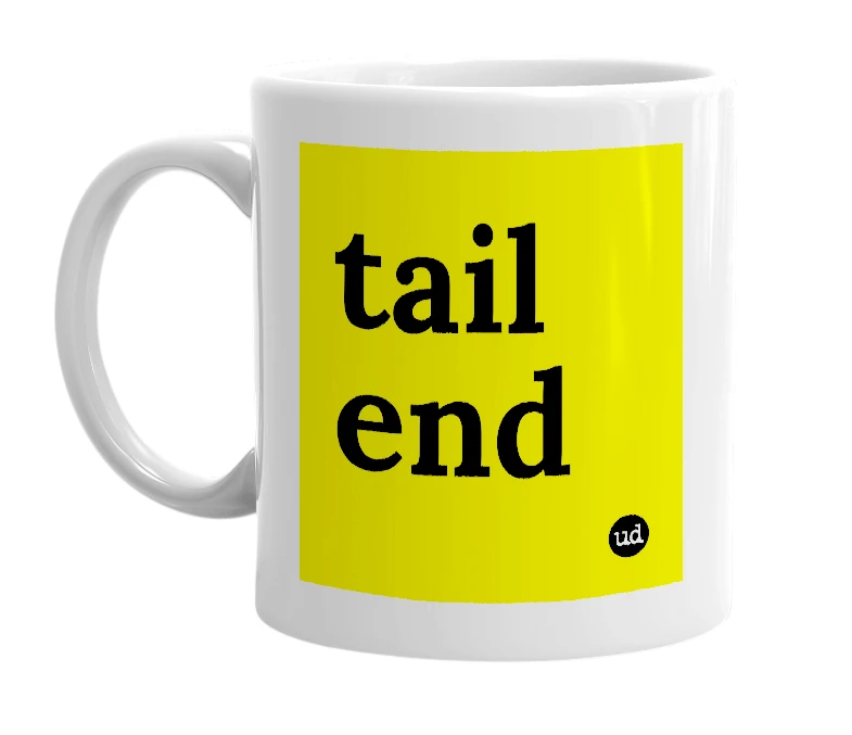 White mug with 'tail end' in bold black letters