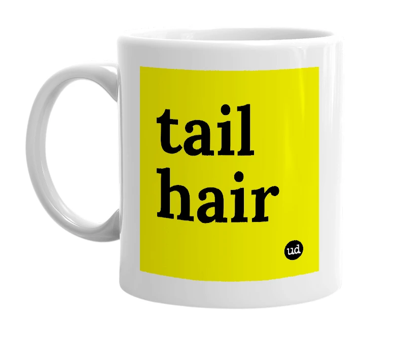 White mug with 'tail hair' in bold black letters