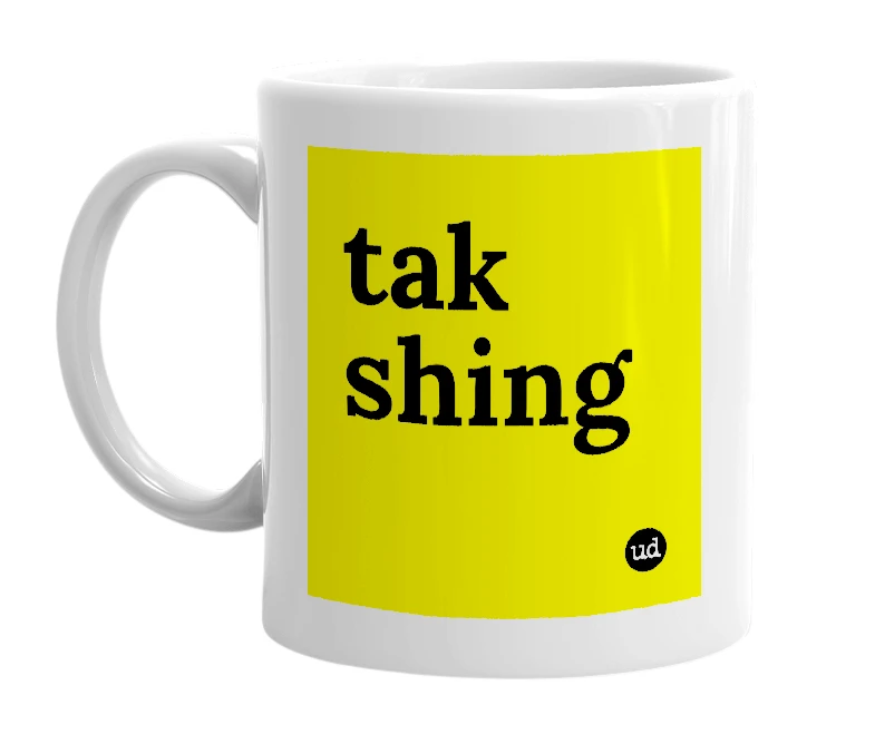 White mug with 'tak shing' in bold black letters