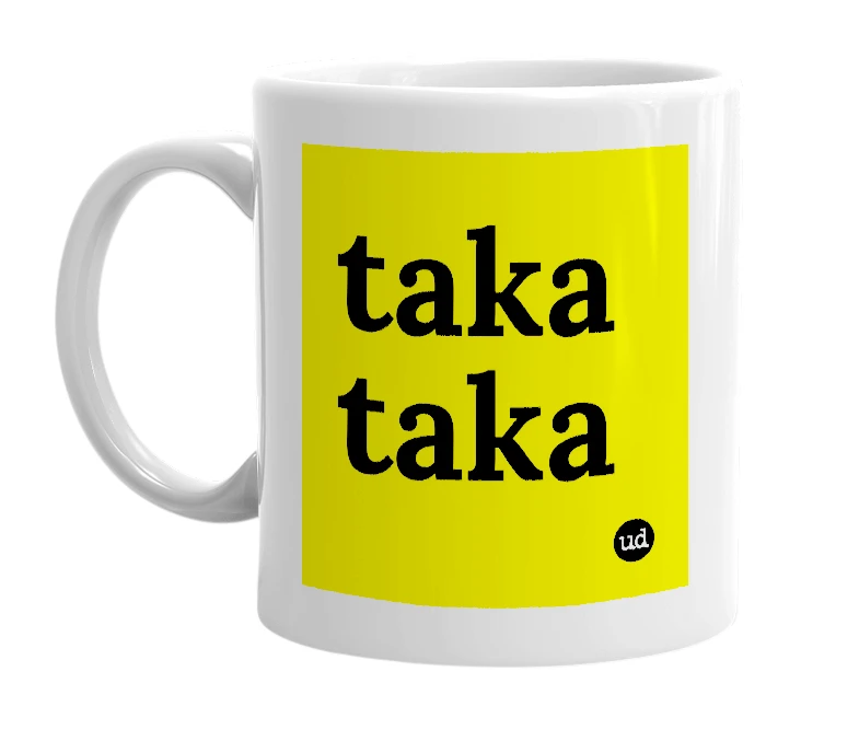 White mug with 'taka taka' in bold black letters