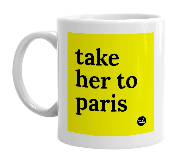 White mug with 'take her to paris' in bold black letters