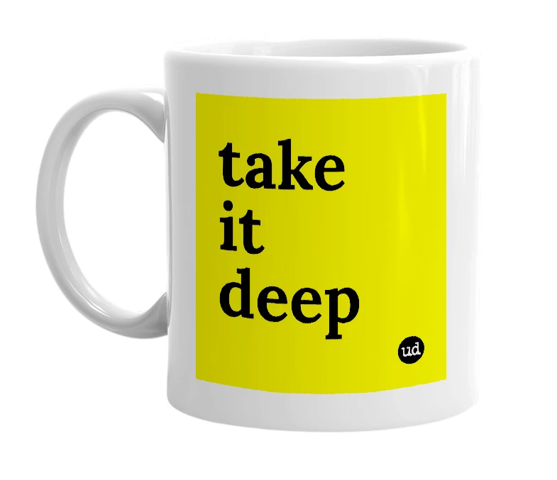 White mug with 'take it deep' in bold black letters