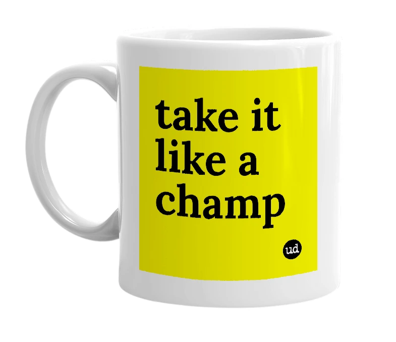 White mug with 'take it like a champ' in bold black letters