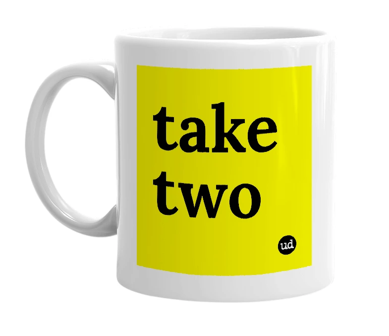 White mug with 'take two' in bold black letters