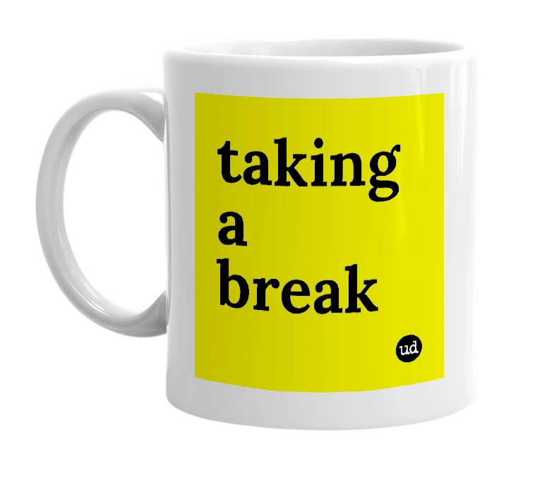 White mug with 'taking a break' in bold black letters